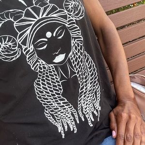 Wmns sleeveless black Aries logo tshirt (z scales) cotton-poly blend, worn.